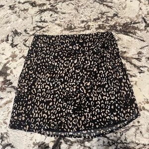 Leopard print tie skirt.